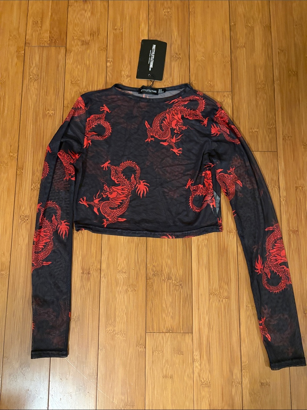 PrettyLittleThing Black Mesh Long-Sleeve Crop Top with Red Dragon Print